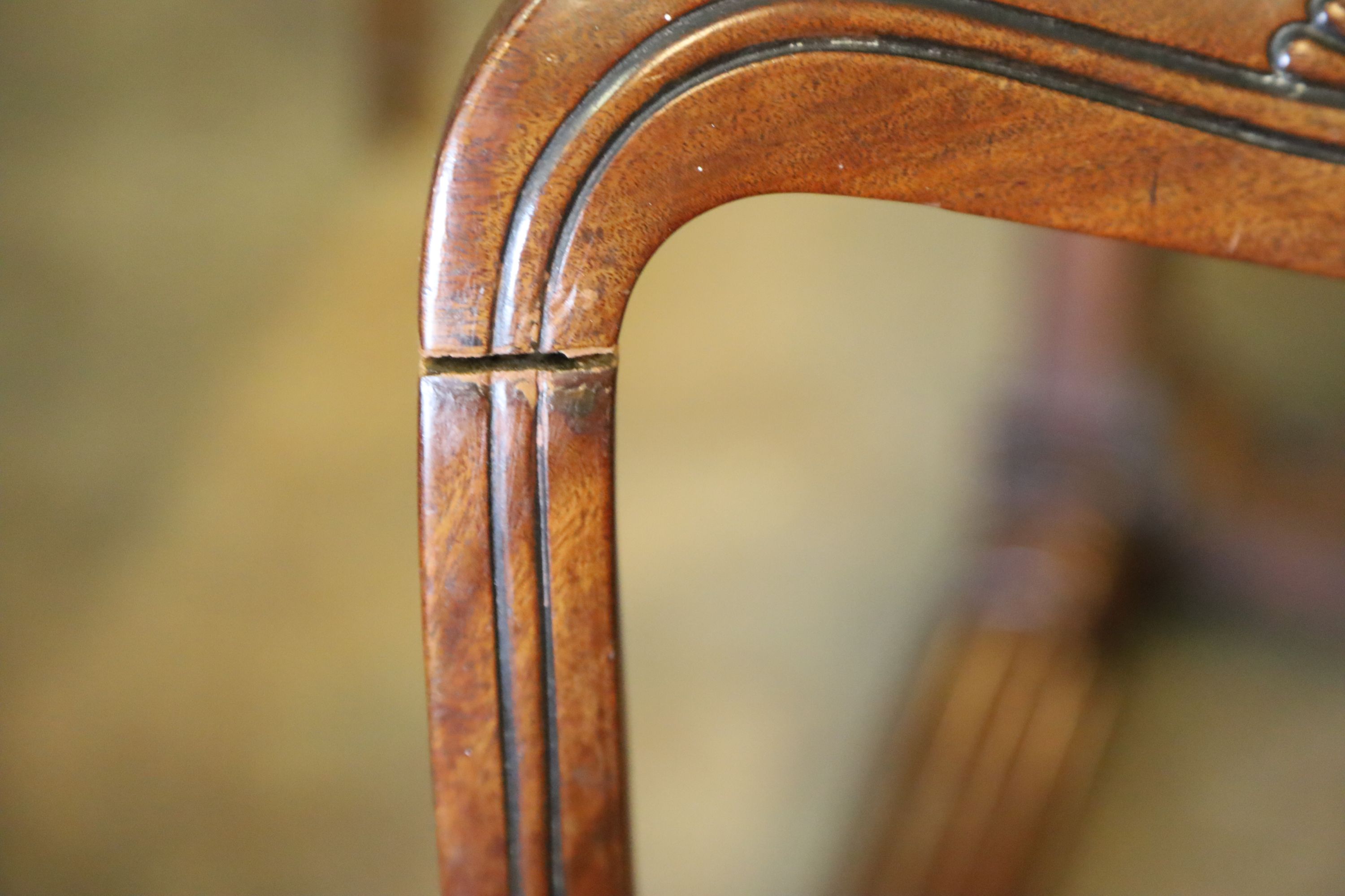 A set of four William IV mahogany buckle back dining chairs, W.48.5cm D.58.5cm H.85cm